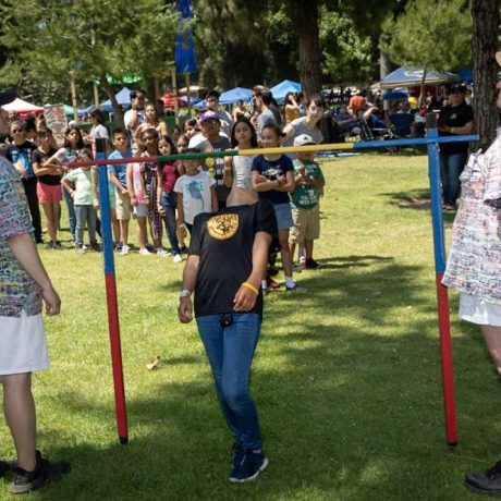 kid playing limbo