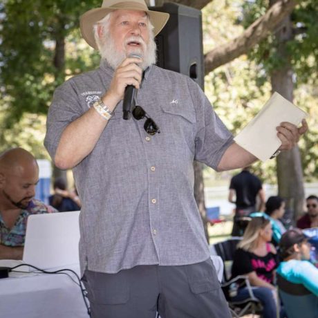 man speaking on microphone