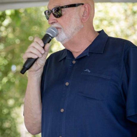 man speaking into microphone