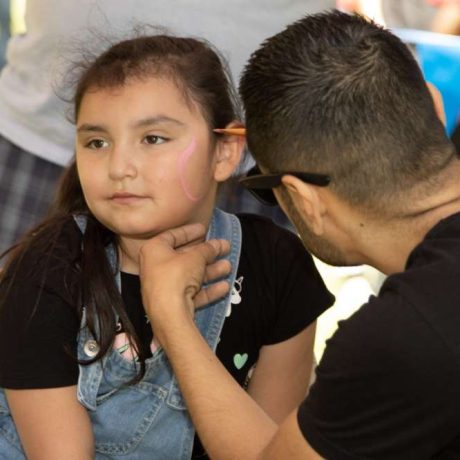 kid getting facepaint