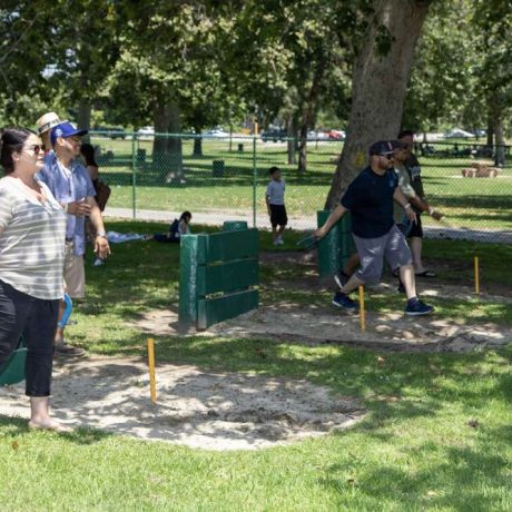 people playing horseshoes