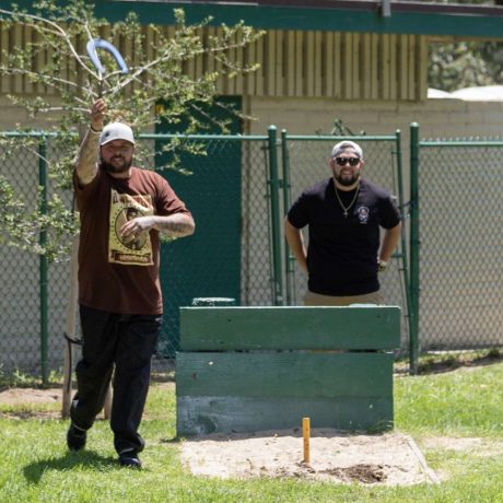 men playing horseshoes