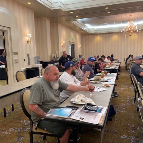 people seated watching seminar