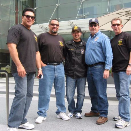 teamsters standing together smiling in teamster clothing