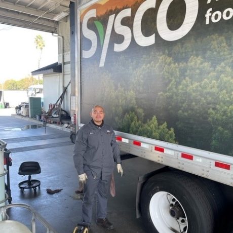 man standing in front of truck