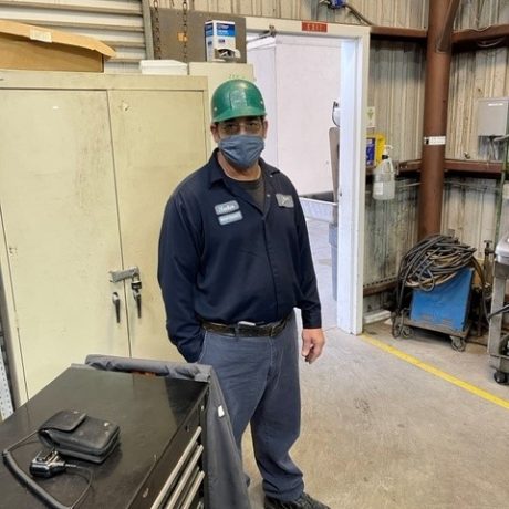 man standing at workplace