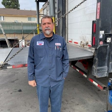 man standing in front of truck