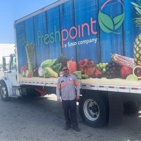 man standing in front of truck