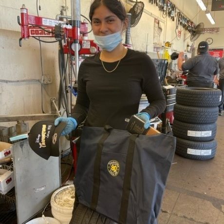 woman smiling working in garage