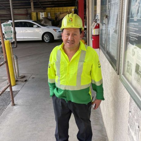 man wearing work clothing and hard hat