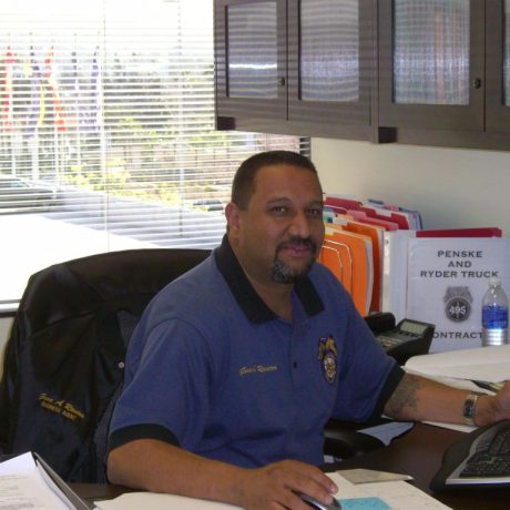 gene rivera working at desk