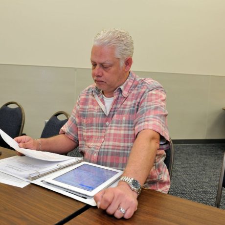 man reviewing documents