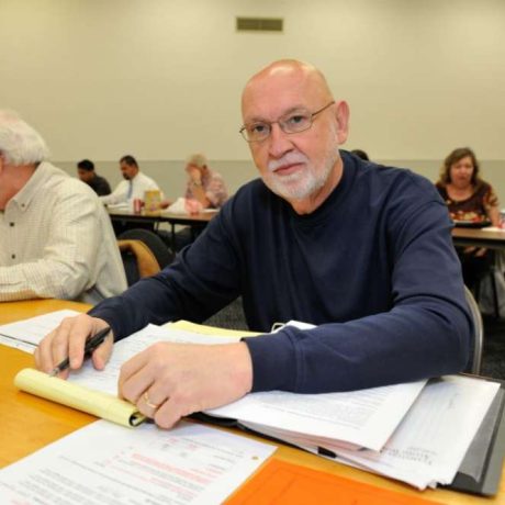 man reviewing paperwork