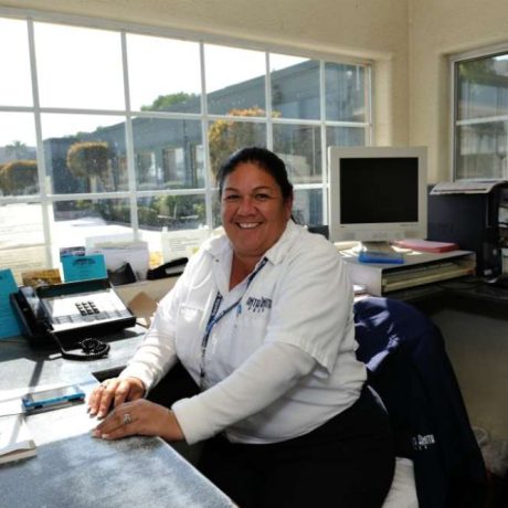 woman smiling working at desk