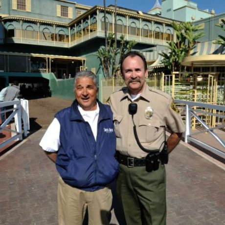 man standing with law officer