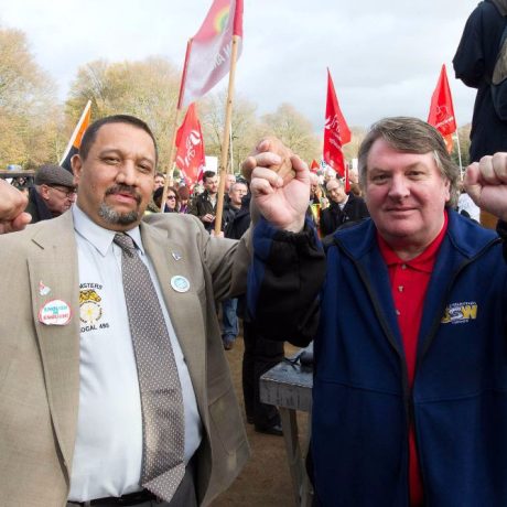 people standing together at rally