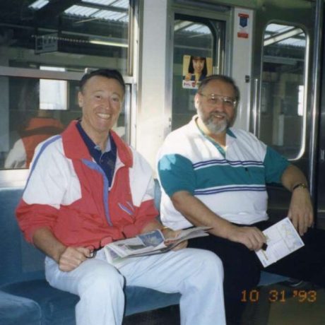 karl ullman and friend sitting on train