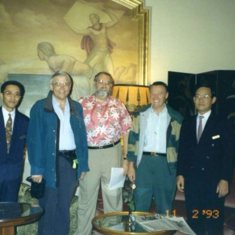 group of men smiling together for photo