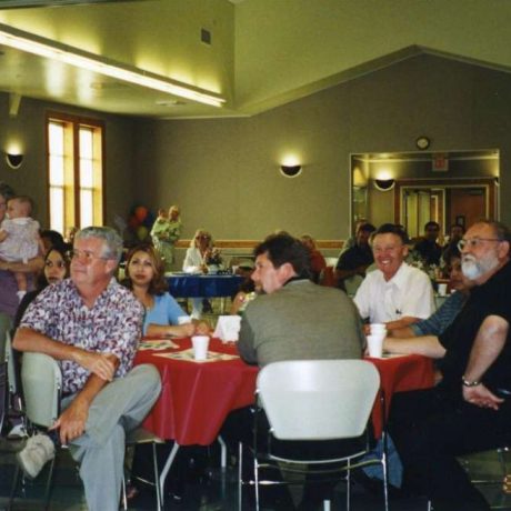 people seated in room with tables