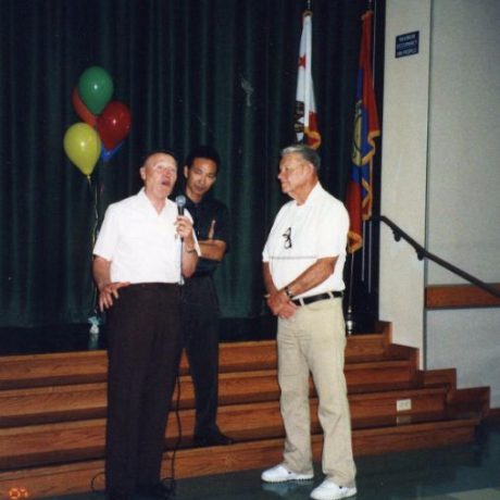 men speaking together